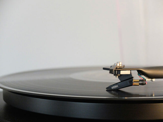 Photo by Adrian Korte unsplash.com Vinyl Record Playing