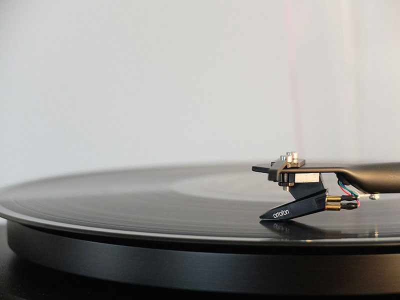 Photo by Adrian Korte unsplash.com Vinyl Record Playing